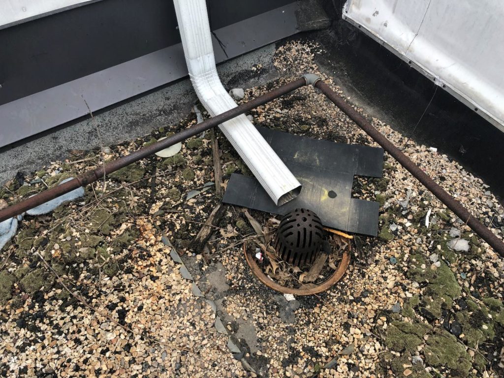 Clogged roof drains can lead to costly repairs